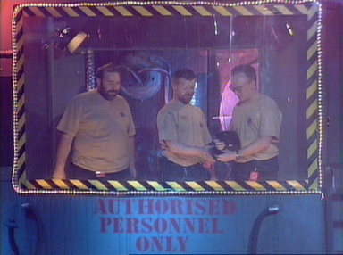 1 - The team in the booth, preparing for the bout